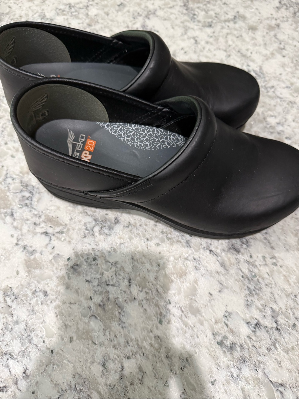 Dansko Black Leather Slip-On Clog for Women